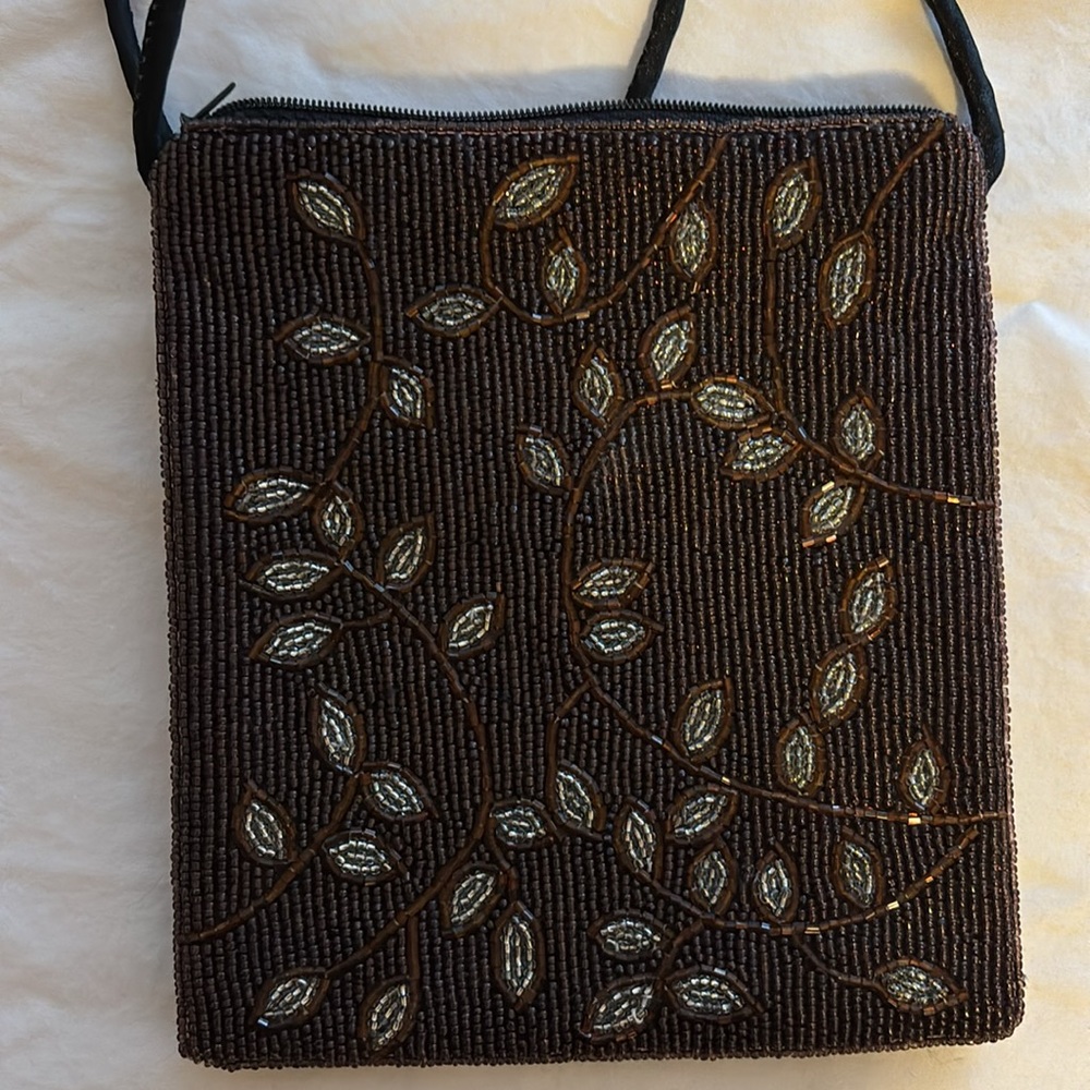 Elegant Brown Black Shoulder Bag with zipper.